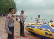 Personel Pamobvit Patroli di Pantai Toronipa, Ingatkan Pengunjung Agar Berhati-hati Saat Berenang